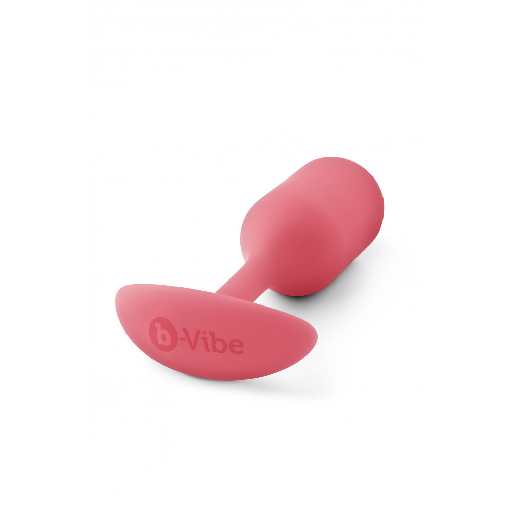 Секс игрушки - Бесшовная силиконовая анальная пробка с утяжелением B-Vibe - Snug Plug 2 коралловая 3
